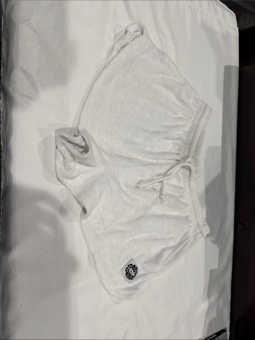 H&M White Terry Drawstring Shorts with Black Logo Tag
